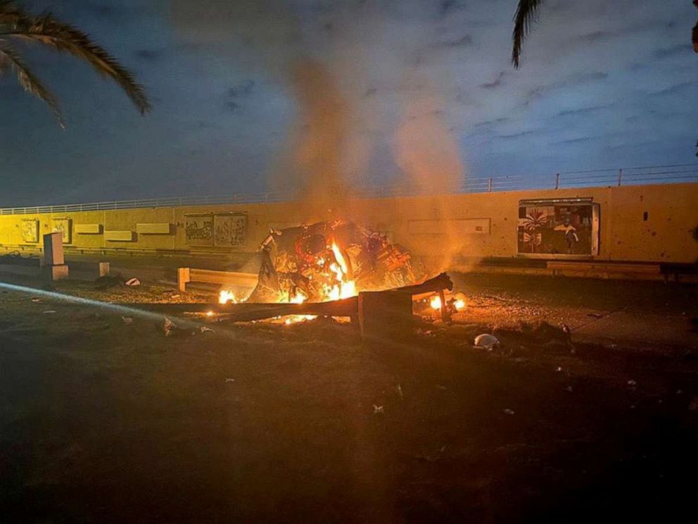 PHOTO: Burning debris is seen on a road near Baghdad International Airport, which according to Iraqi paramilitary groups were caused by three rockets hitting the airport in Iraq, Jan. 3, 2020, in this image obtained via social media.