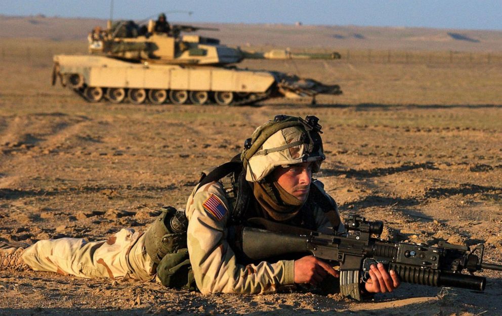 PHOTO: U.S. Army Cpl. Matthew Patnode, from Chateaugay, New York, trains with other members of the 1-30 Bravo company, Jan. 24, 2003, near the Iraqi border in northern Kuwait. 