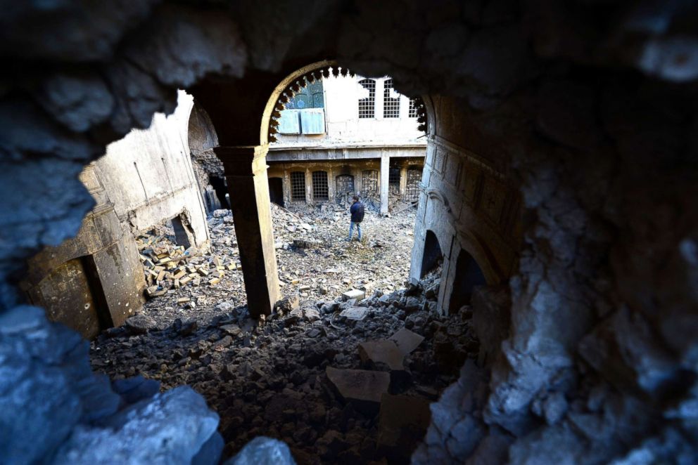 PHOTO: An Iraqi man inspects the destruction at the old city area, in the west side of Mosul city, Iraq, Feb. 2, 2018.