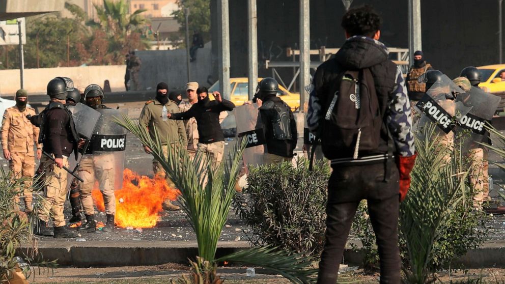 PHOTO: Security forces try to disperse anti-government protesters during clashes in central Baghdad, Iraq, Monday, Jan. 20, 2020. 
