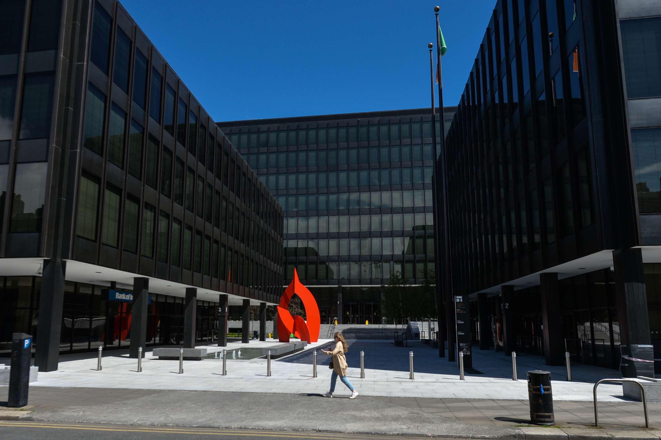 PHOTO: A pedestrian walks past the Department of Health headquarters in Dublin, Ireland, May 16, 2021.