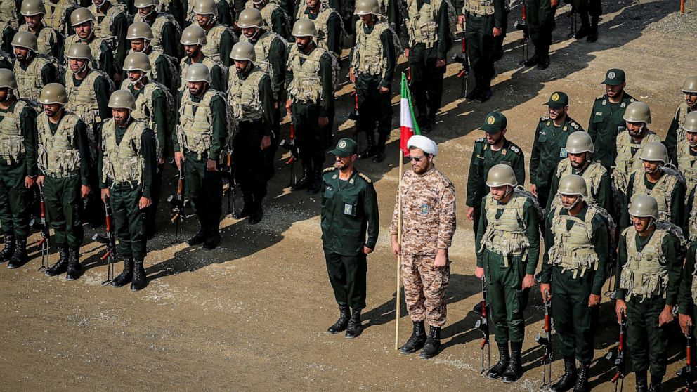 FILE PHOTO: Members of the Islamic Revolutionary Guard Corps (IRGC) attend an IRGC ground forces military drill in the Aras area, East Azerbaijan province, Iran, Oct. 17, 2022.