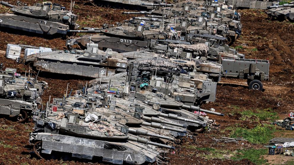 PHOTO: Israeli tanks on the Israeli side of the Israel-Lebanon border, following an escalation between Hezbollah and Israel amid the U.S.-Israeli conflict with Iran, in northern Israel, March 8, 2026.