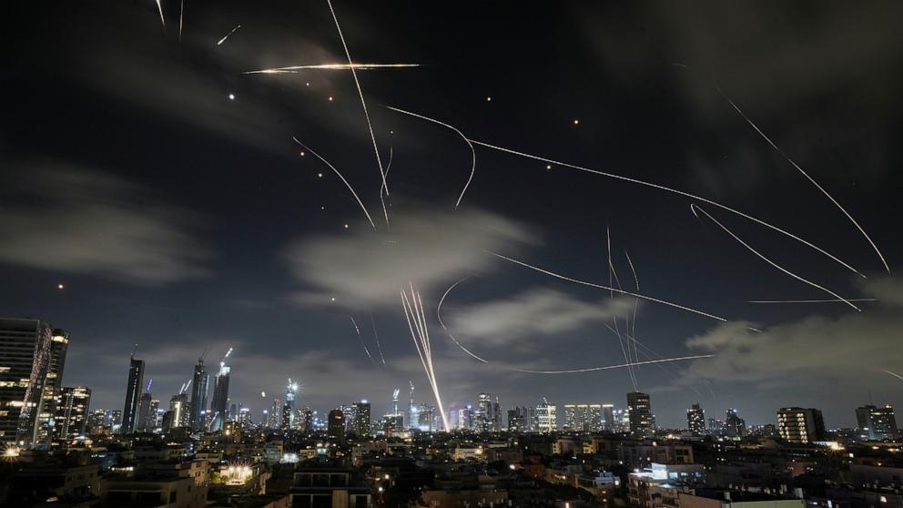 PHOTO: The Israeli Iron Dome air defense system fires to intercept missiles during an Iranian attack over Tel Aviv, Israel, June 18, 2025.
