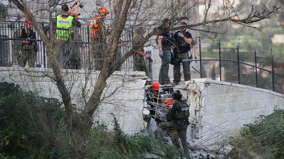 PHOTO: Security personnel inspect the damage in Jerusalem's Old City after Iran launched missiles towards Jerusalem, amid the U.S.-Israel conflict with Iran, March 20, 2026.