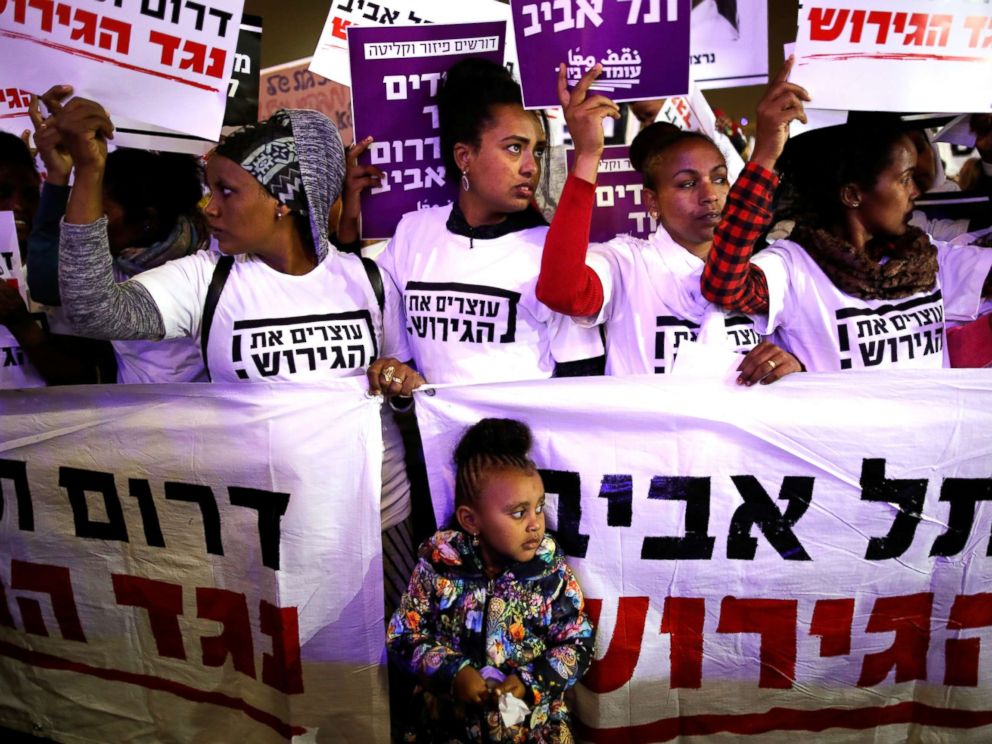 PHOTO: People take part in a protest against the Israeli governments plan to deport African migrants, in Tel Aviv, Israel March 24, 2018.
