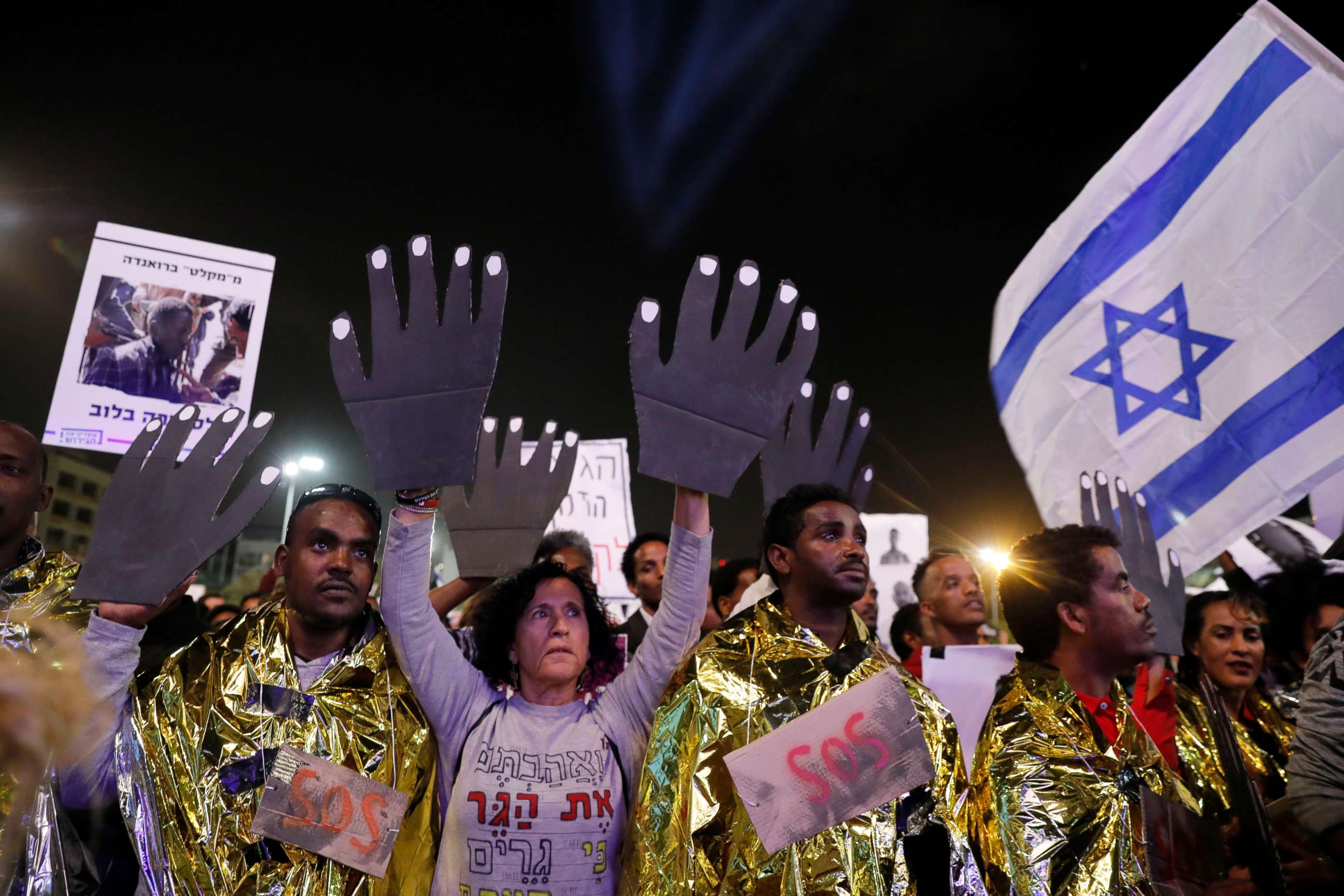 PHOTO: People protest against the deportation of African asylum seekers during a demonstration in Rabin square, Tel Aviv, Israel, March 24, 2018.