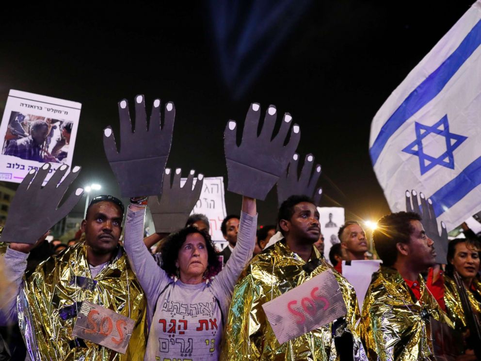 PHOTO: People protest against the deportation of African asylum seekers during a demonstration in Rabin square, Tel Aviv, Israel, March 24, 2018.