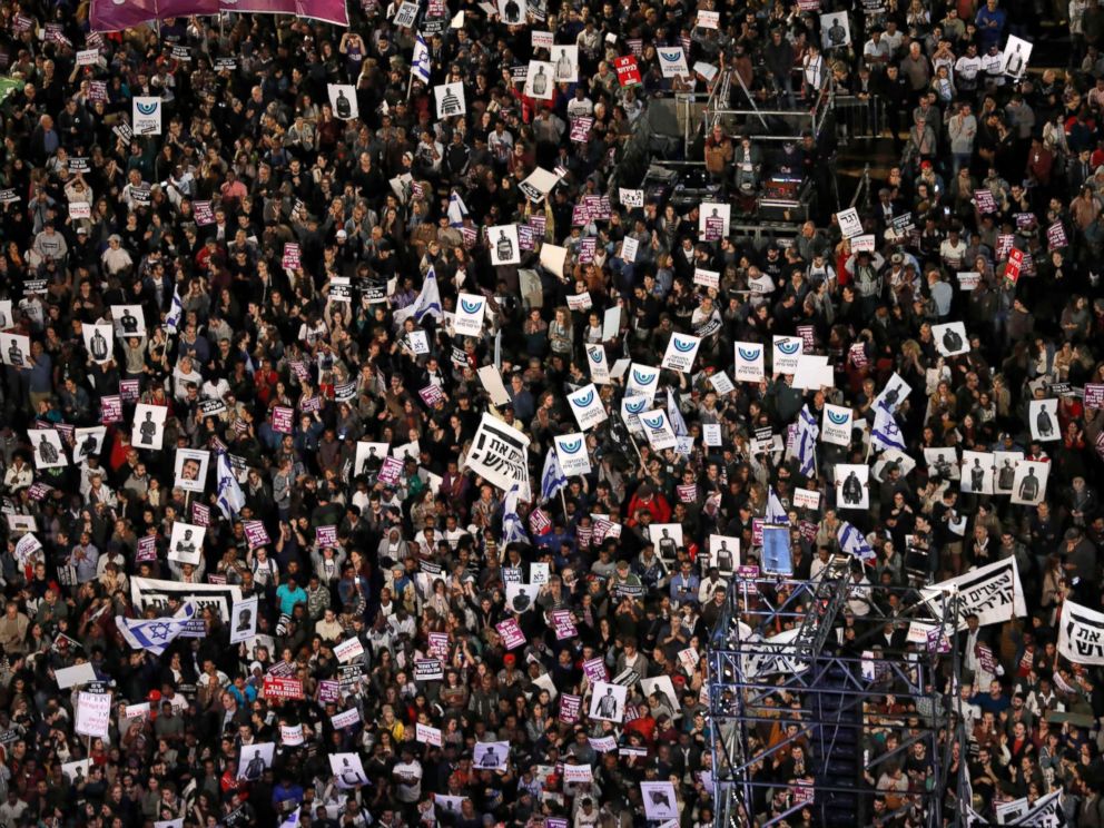 PHOTO: People protestg against the deportation of African asylum seekers in a demonstration in Rabin square, Tel Aviv, Israel, March 24, 2018.