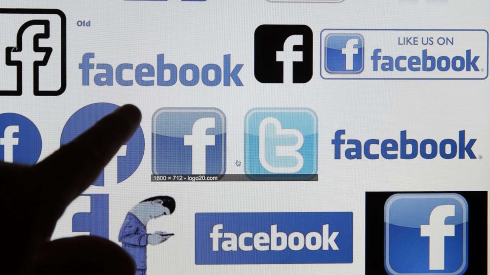 A photo illustration showing various Facebook logos on a computer screen, March 20, 2018 in Paris, France. 