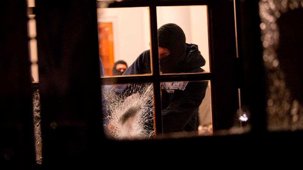 PHOTO: Students with the Gaza Solidarity Encampment break the doors to the entrance of Hamilton Hall at Columbia University after taking it over, in New York City, April 30. 2024. 