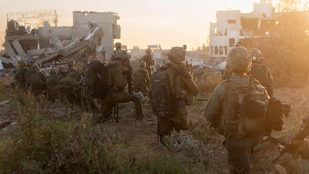 PHOTO: Israeli soldiers take a position as part of the activity of the 99th Division in the Zaytoun Area of Gaza City, May 10, 2024.