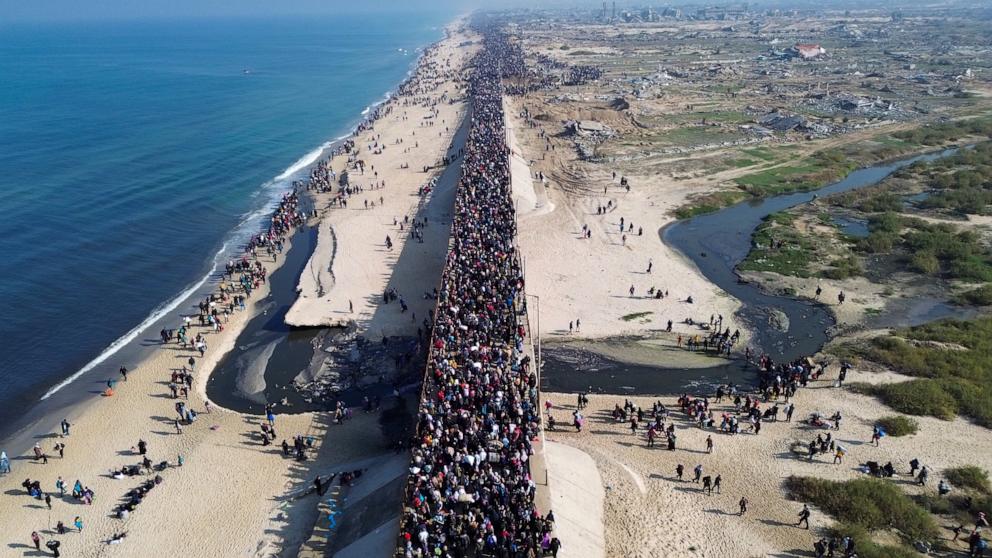 PHOTO: Displaced Gazans walk towards Gaza City on January 27, 2025, after crossing the Netzarim corridor from the southern Gaza Strip.