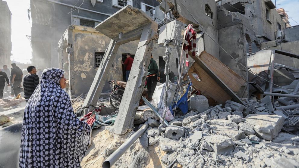 PHOTO: Palestinian citizens carry out search and rescue operations amid the destruction caused by Israeli air strikes, Dec.8, 2023, in Khan Yunis, Gaza.