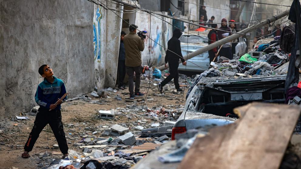 PHOTO: People assess the damage caused by Israeli bombardment in Rafah in the southern Gaza Strip on Feb. 9, 2024, as battles continue between Israel and the Palestinian Hamas movement. 