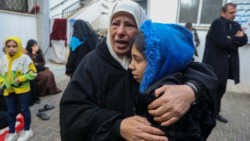 PHOTO: People mourn as they receive the dead bodies of victims of an Israeli strike on Feb. 9, 2024, in Rafah, Gaza. 