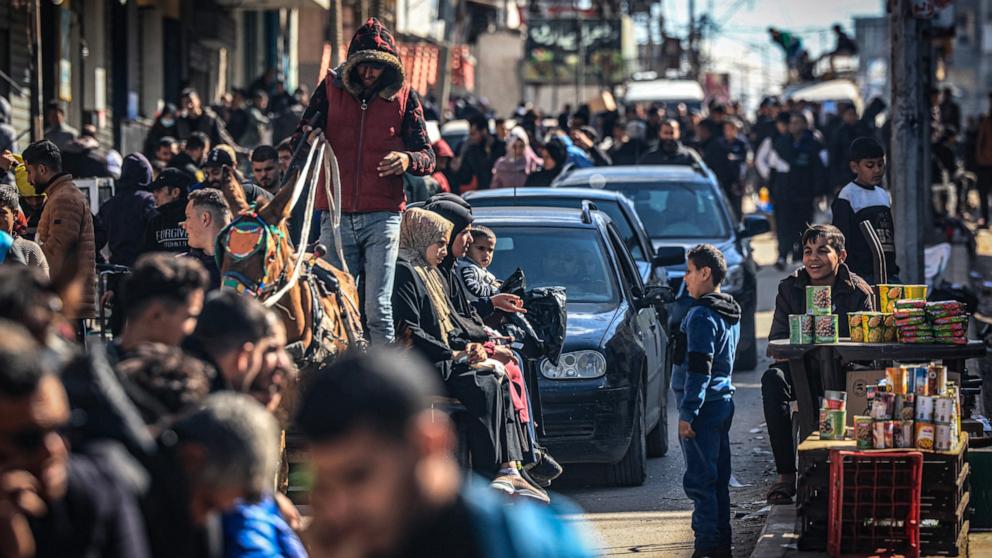 PHOTO: People who fled fighting in the Gaza Strip gather along an overcrowded street in Rafah in the southern part of the Palestinian territory, Feb. 1, 2024.