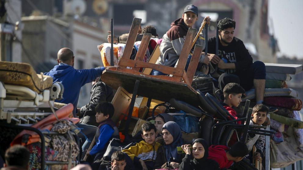 PHOTO: Residents of Al Nuseirat and Al Bureij refugee camps evacuate during Israeli military operations in the Gaza Strip, Jan. 4 2024.