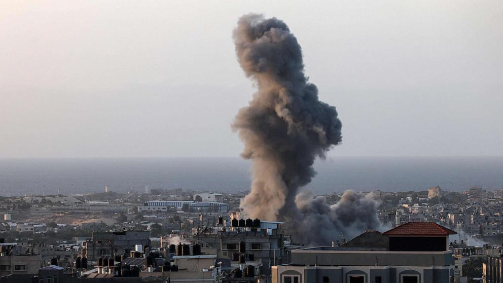 PHOTO: A plume of smoke rises over Rafah in the southern Gaza Strip during an Israeli strike, Nov. 9, 2023.