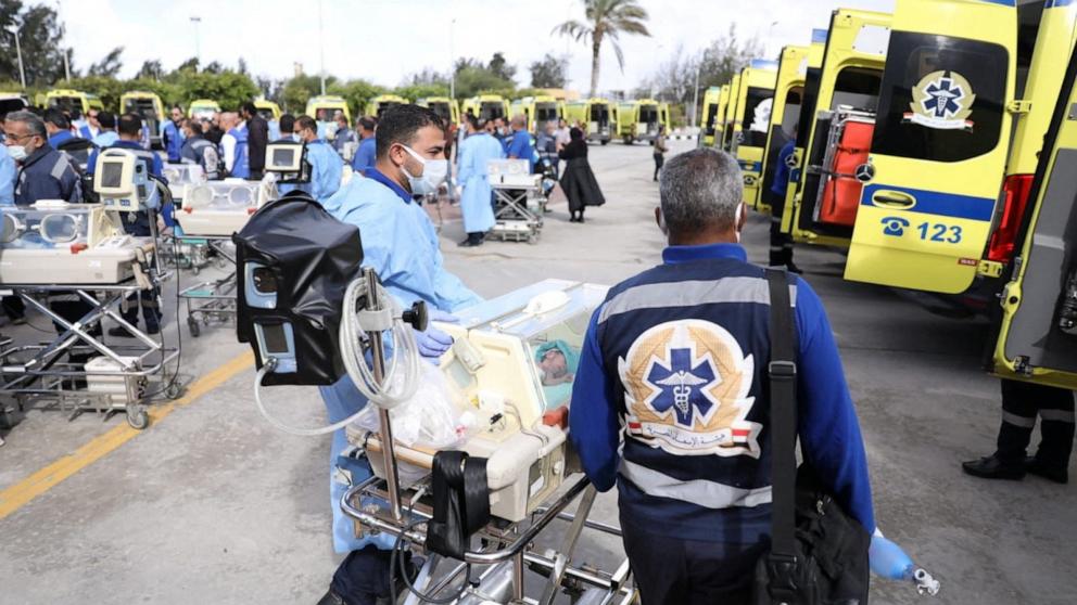 PHOTO: Egyptian ambulance crews transfer premature Palestinian babies evacuated from Gaza to ambulances on the Egyptian side of the Rafah border in Rafah, Egypt Nov. 20, 2023.