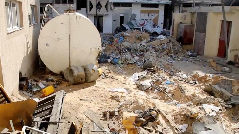 PHOTO: Destroyed buildings and rubble are seen around the damaged PRCS Al-Amal Hospital in Khan Younis, Gaza, Apr. 7, 2024.