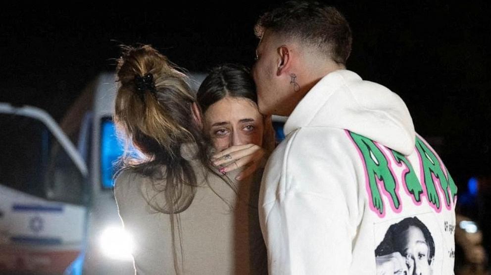 PHOTO: Mia Schem reunites with her mother and brother following her release after being held hostage by the Palestinian militant group Hamas in the Gaza Strip, in Hatzerim military base in Israel, Nov. 30, 2023. 