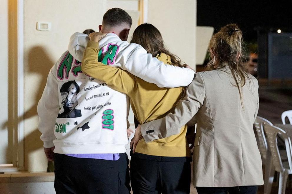 PHOTO: Mia Schem reunites with her mother and brother following her release after being held hostage by the Palestinian militant group Hamas in the Gaza Strip, in Hatzerim military base in Israel, Nov. 30, 2023.