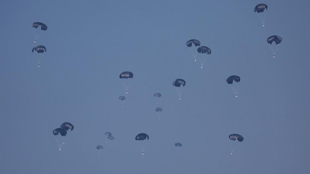 PHOTO: Aid is air-dropped over Gaza, amid the ongoing the conflict between Israel and Hamas, in Rafah in the southern Gaza Strip, Feb. 27, 2024. 