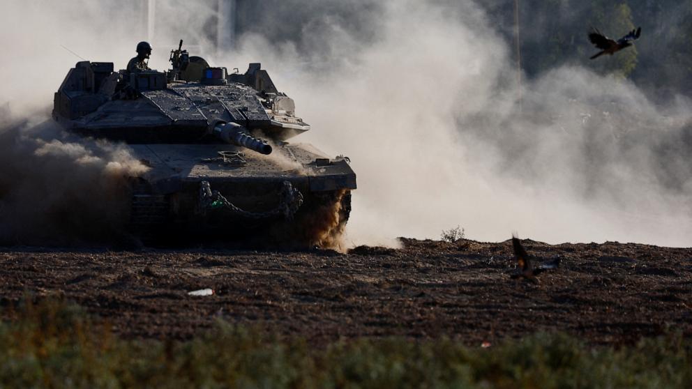 PHOTO: An Israeli tank maneuvers near the Israel-Gaza border, amid the ongoing conflict between Israel and Hamas, in Israel, Aug. 14, 2024. 