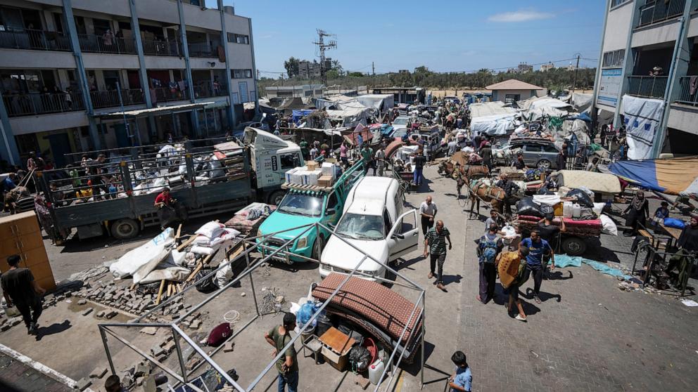 PHOTO: Palestinians evacuate a school that had been their shelter, in eastern Deir al-Balah, Gaza Strip, Aug. 16, 2024.