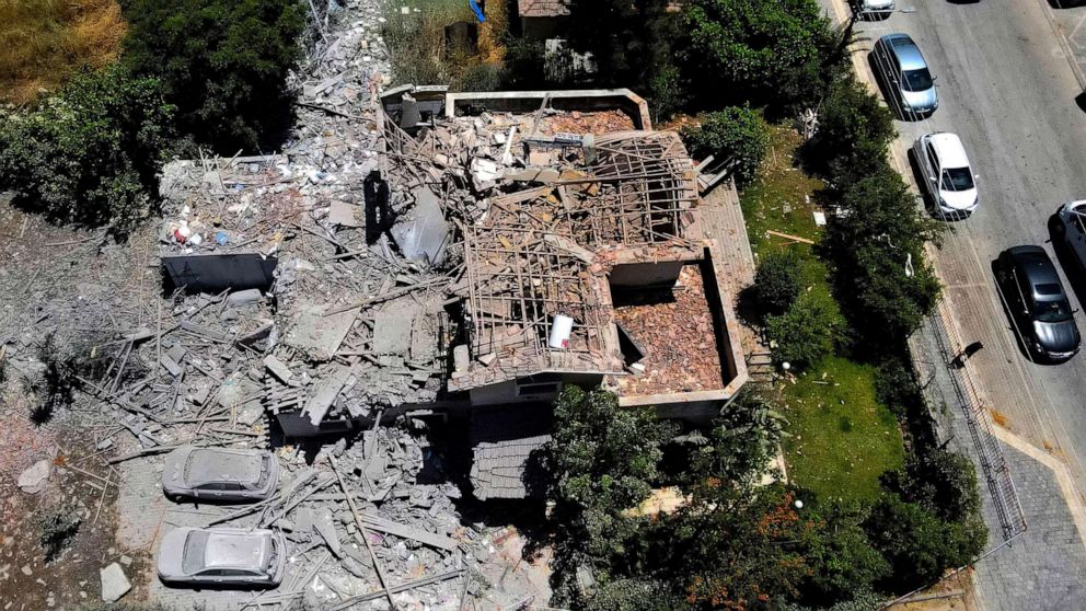 PHOTO: A heavily damaged house is pictured in a residential area in the city of Yehud, in central Israel, May 12, 2021, after rockets were fired by the Hamas movement from the Gaza Strip.