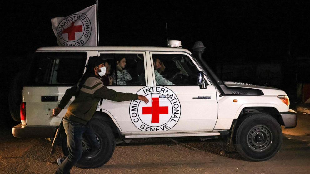 PHOTO: An International Red Cross vehicle reportedly carrying hostages released by Hamas drives towards the Rafah border point with Egypt ahead of their transfer to Israel on Nov. 25, 2023.