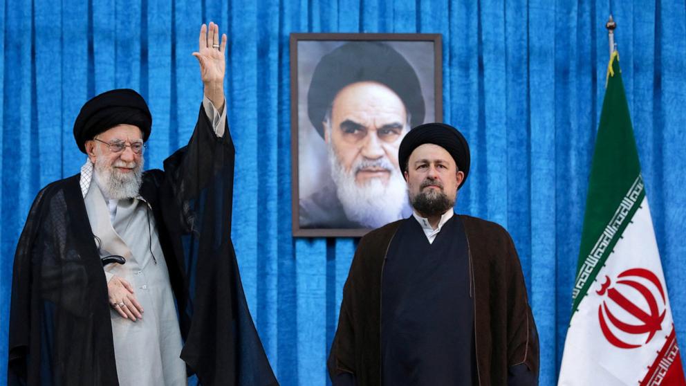 PHOTO: Ayatollah Ruhollah Khomeini's grandson, Hassan Khomeini stands next to Iran's Supreme Leader Ayatollah Ali Khamenei as they mark the 36th anniversary of the death of the leader of Iran's 1979 Islamic Revolution, in Tehran, Iran, June 4, 2025.
