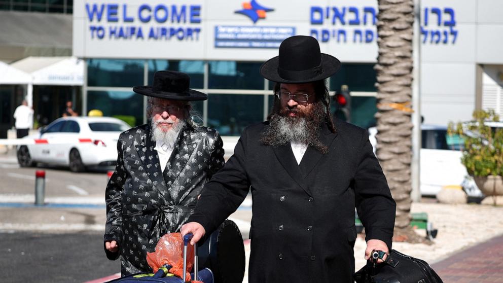 PHOTO: Israelis arrive at the Haifa International Airport as the first flights back to Israel started since its civilian airspace was closed last week, in Haifa, Israel, June 18, 2025.