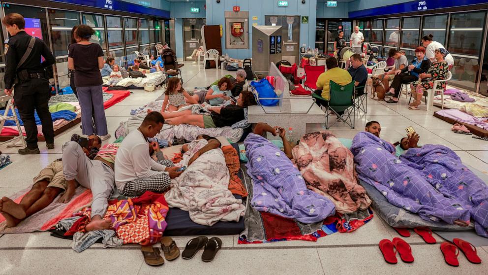 PHOTO: People take shelter for the night at an underground light rail station in the city of Ramat Gan, east of Tel Aviv, June 17, 2025 amidst fears of an Iranian missile attack.