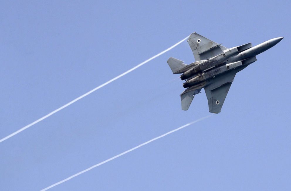 PHOTO: An Israeli F-15 fighter jet performs a rehearsal ahead of an air show to commemorate the 70th anniversary of the creation of Israel in May, in the coastal city of Tel Aviv, April 12, 2018. 