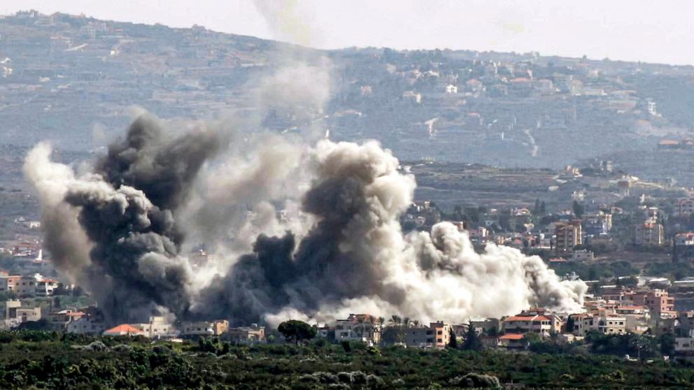 PHOTO: This picture taken from Lebanon's southern city of Tyre shows a cloud of smoke erupting following an Israeli air strike on the village of Deir Qanoun, Oct. 14, 2024.