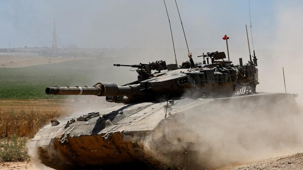 PHOTO: An Israeli soldier sits in a tank near the Israel-Gaza border, amid the ongoing conflict between Israel and the Palestinian Islamist group Hamas, in Israel, May 15, 2024.