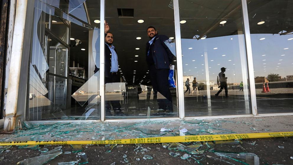 PHOTO: Airport staff stand near broken windows as they inspect the damage at Sana'a airport a day after Israeli airstrikes targeted the airport, in Sana'a, Yemen, Dec. 27, 2024. 