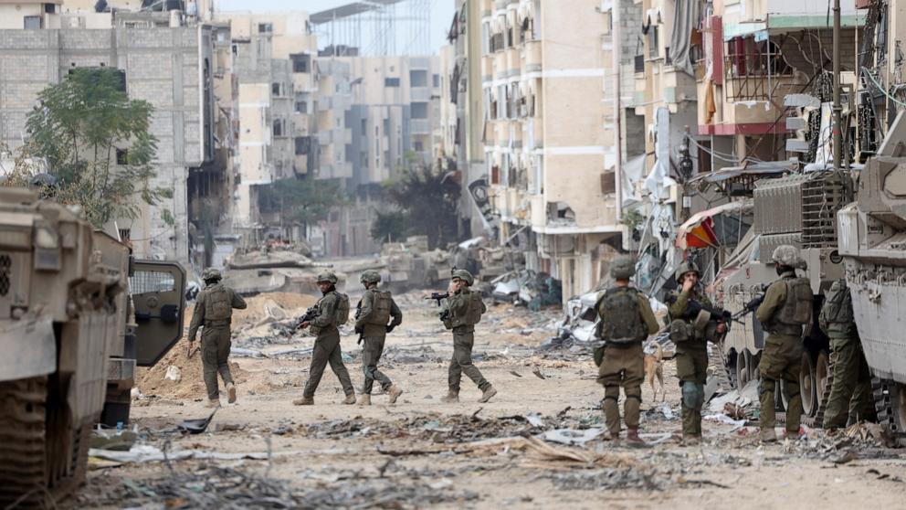 PHOTO: Israeli soldiers patrol near Al-Shifa Hospital in Gaza City on Nov. 22, 2023, amid the Israeli military's ongoing ground operation against Palestinian militant group Hamas in the northern Gaza Strip.