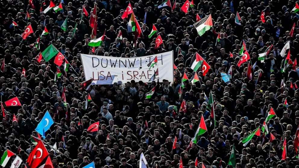 PHOTO: Pro-palestinians protesters chant slogans against U.S. and Israel as they wave Turkish and Palestinians flags, Dec. 10, 2017 during a demonstration in Istanbul.