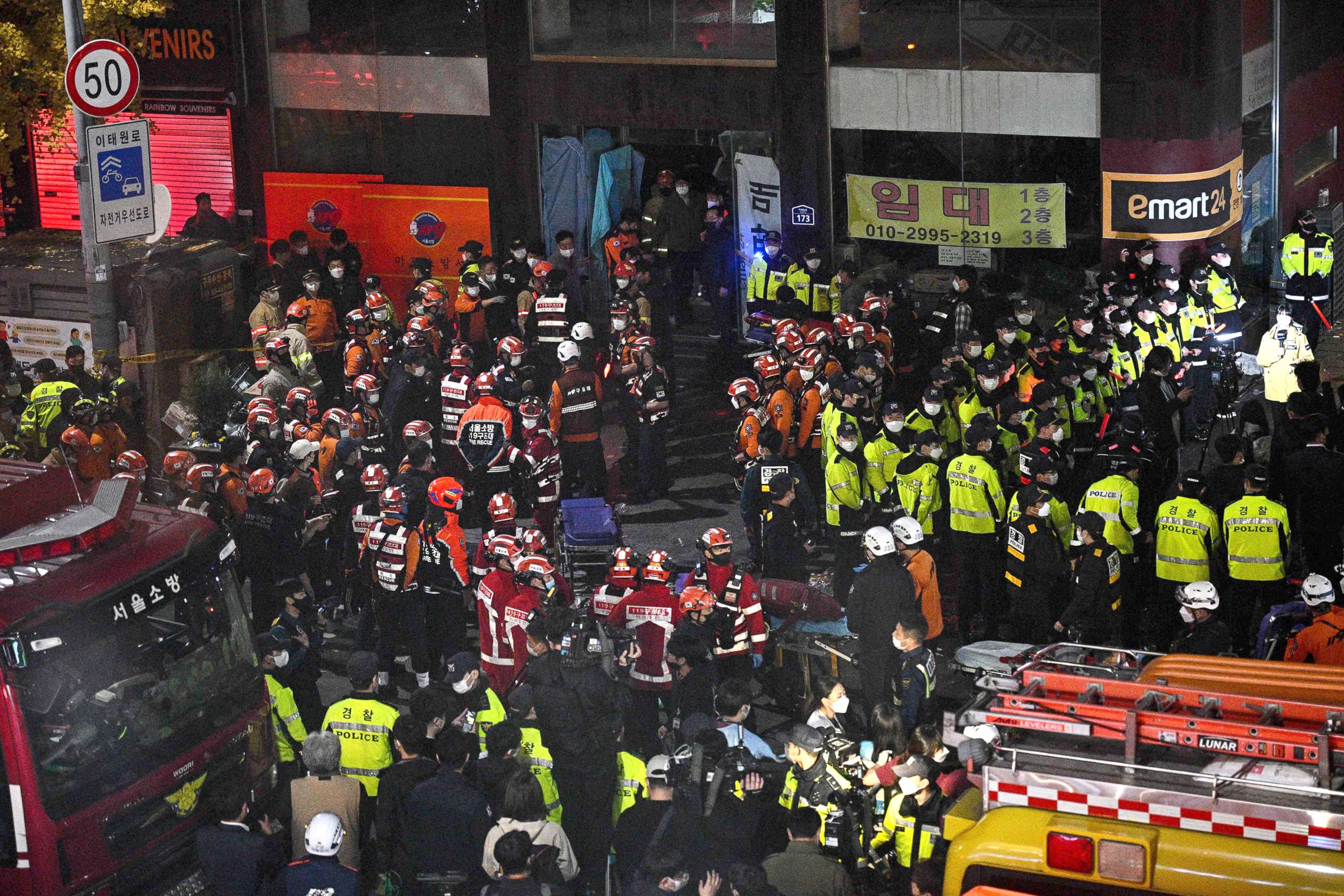 PHOTO: Rescue officials and police gather in the district of Itaewon after a Halloween stampede in Seoul, Oct. 30, 2022.