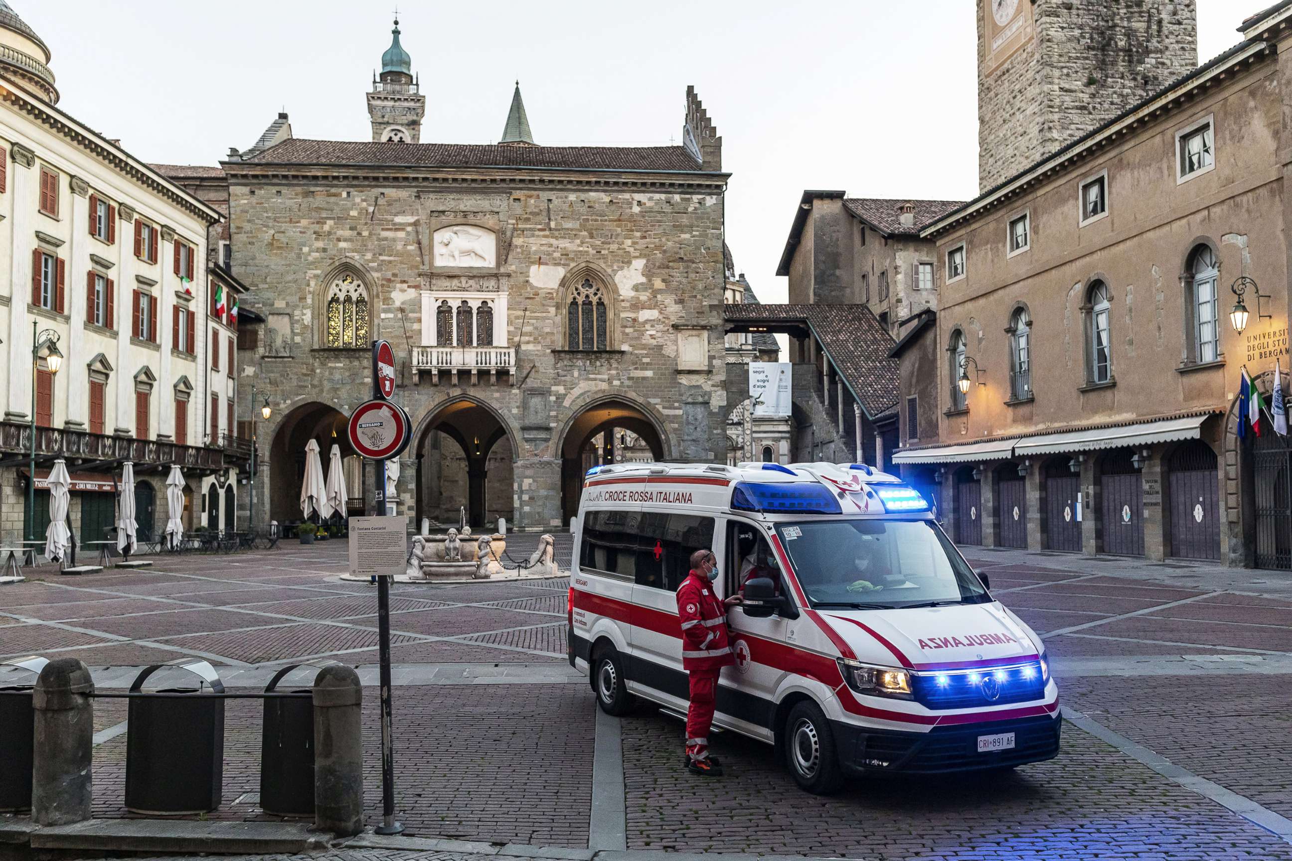 PHOTO: An ambulance of the Italian Red Cross is seen in one of the main squares of the city, on April 8, 2020, in Bergamo, Italy. 