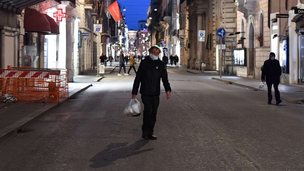 PHOTO: A picture taken on March 10, 2020, shows a deserted Via del Corso shopping street near Piazza del Popolo in Rome.