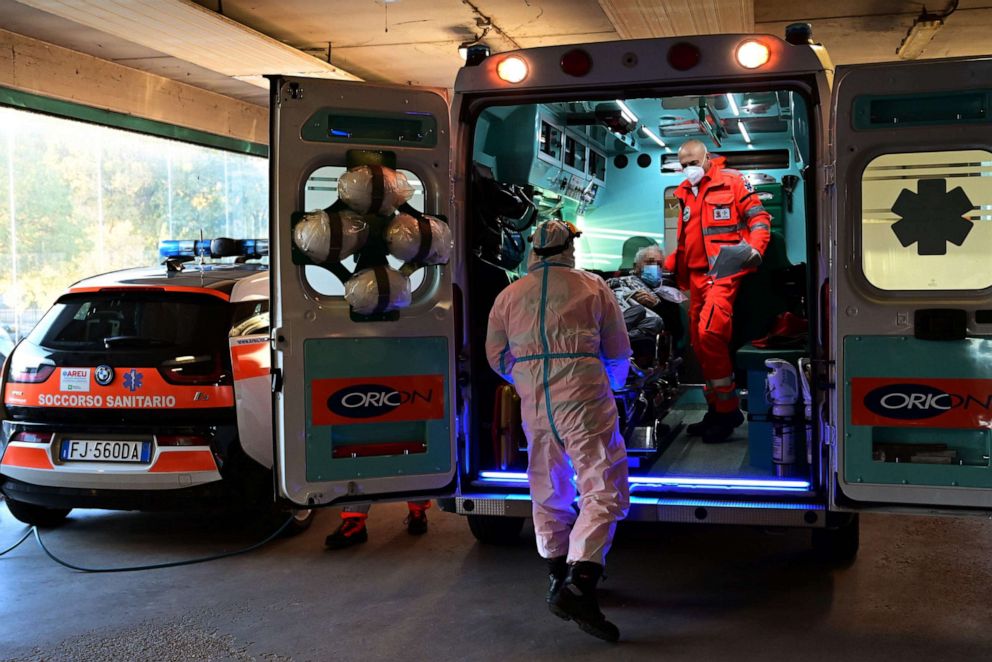 PHOTO: A man is disembarked from an ambulance at the San Carlo hospital in Milan on Oct. 28, 2020, as Europe struggled to contain an alarming surge in COVID-19 cases.