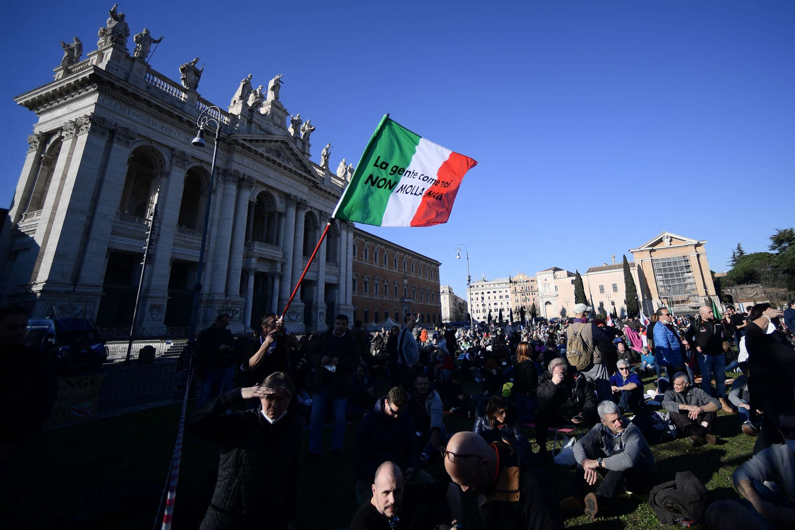 PHOTO: People gather for a demonstration at piazza San Giovanni in Rome, Italy, on Jan. 15, 2022, after new restrictions were imposed in the face of a sharp rise in Covid-19 infections.