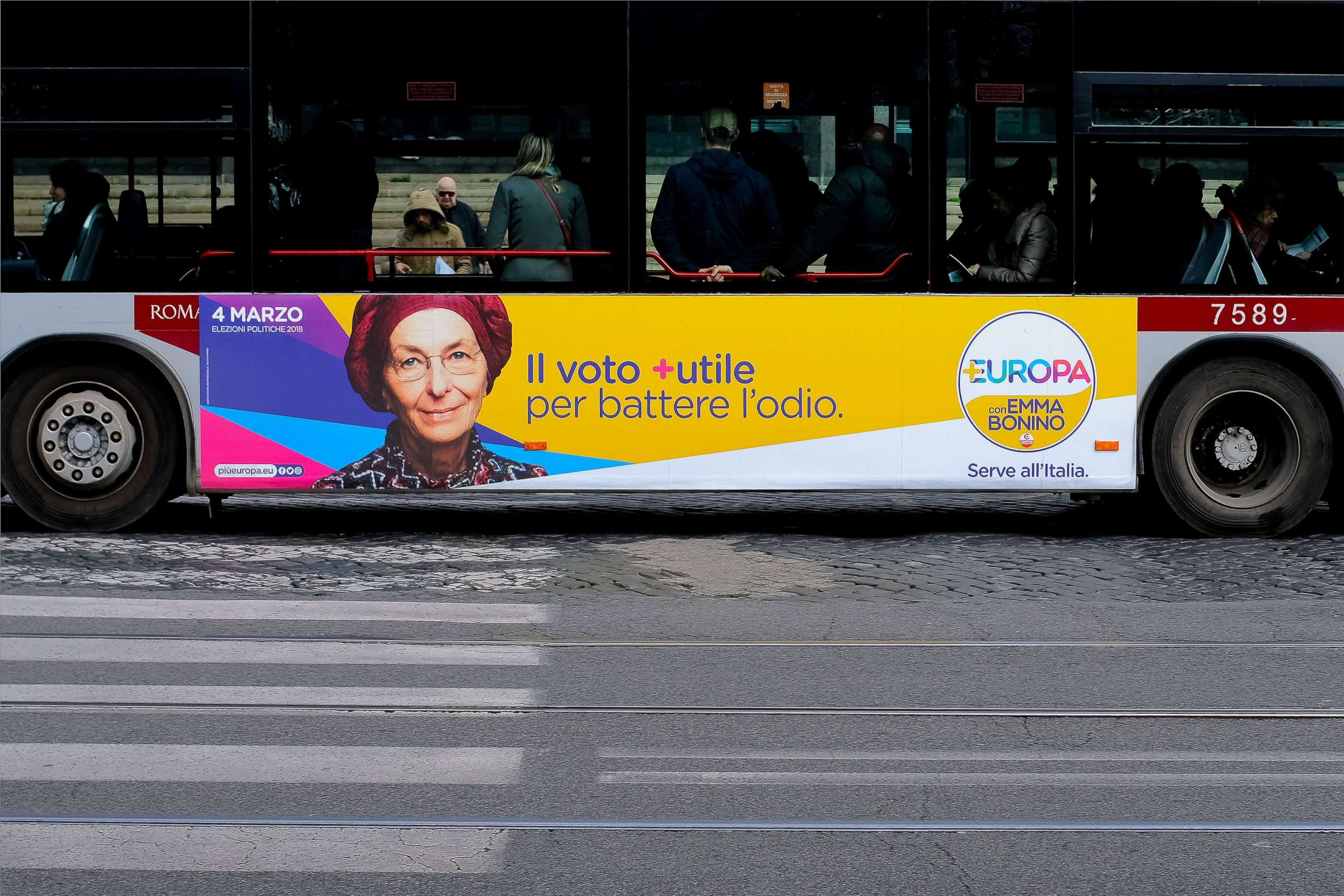 PHOTO: An election poster for the Europa party is seen on the side of a bus in Rome on Feb. 21, 2018, ahead of Italy's March 4 general elections. 