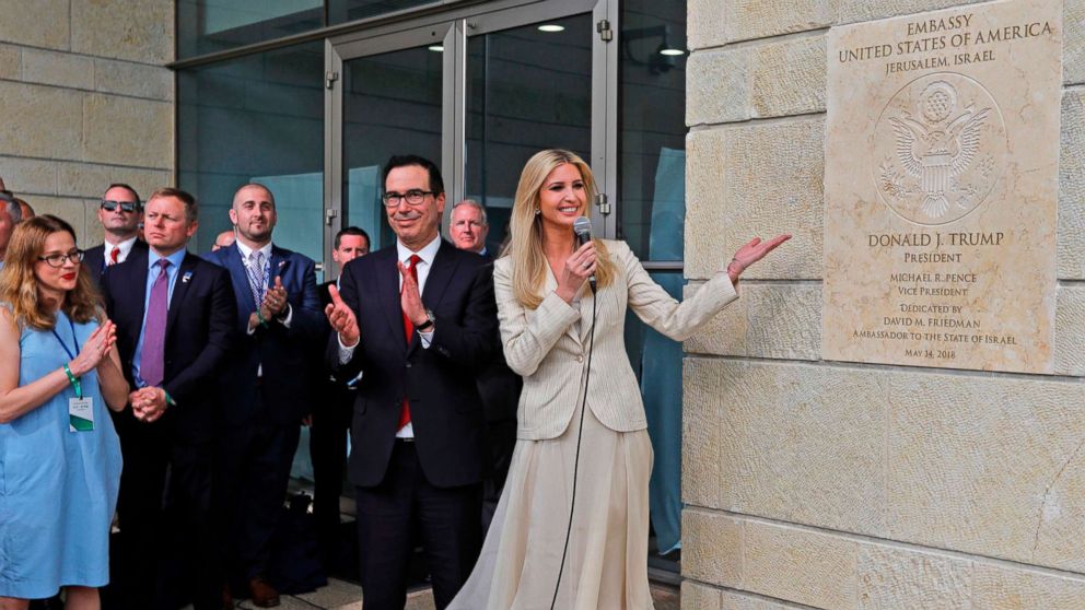 PHOTO: From left, Treasury Secretary Steve Mnuchin claps as White House senior advisor and President Trump's daughter Ivanka Trump unveils an inauguration plaque during the opening of the U.S. embassy in Jerusalem, May 14, 2018.