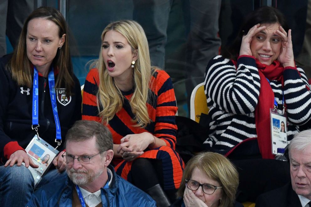 PHOTO: Ivanka Trump, center, cheers while seated between former Olympic US bobsledders Shauna Rohbock, left and Valerie Fleming as she watched the U.S. men's curling team compete for the gold medal against Sweden, Feb. 24, 2018.