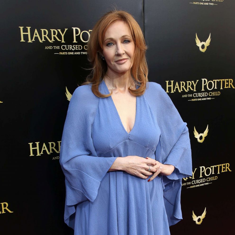 jk rowling blue dress JK Rowling makes red carpet appearance at Fantastic Beasts premiere days after Putin drama | Celebrity News | Showbiz & TV